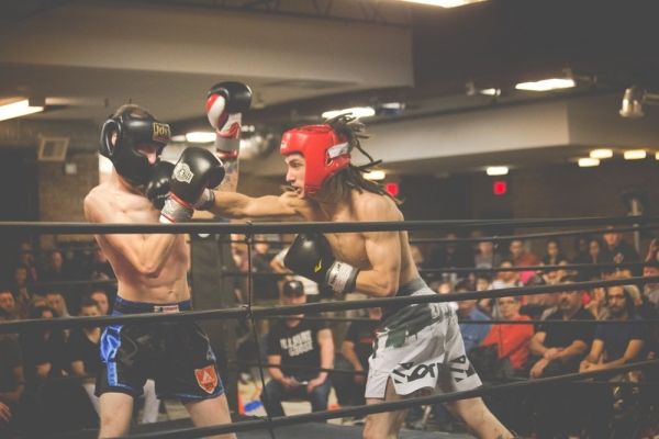 two person playing kick boxing