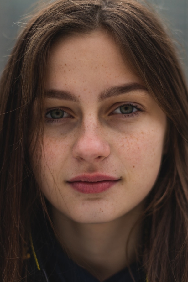 smiling woman wearing red lipstick